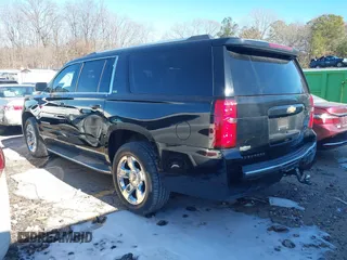 2015 Chevrolet Suburban LTZ with VIN 1GNSCKKC3FR249956, listed as a IAAI auction lot 41306605 with 122,942 mi miles and . Bid and sale history available at DreamBid. Image 3.