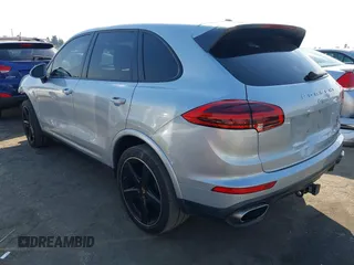 2017 Porsche Cayenne with VIN WP1AA2A20HKA80556, listed as a IAAI auction lot 40449857 with 40,504 mi miles. Bid and sale history available at carsss.com. Image 3.
