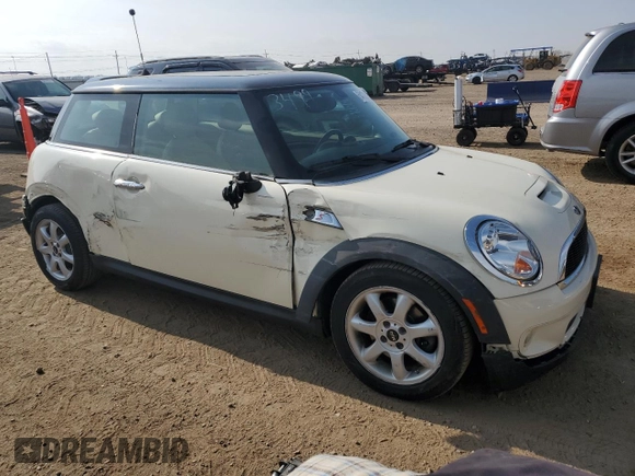2009 MINI Hardtop S with VIN WMWMF73529TW81190, listed as a Copart auction lot 54172195 with 83,841 mi miles and Salvage Title. Bid and sale history available at DreamBid. Image 4.