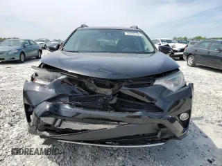 2018 Toyota RAV4 XLE with VIN 2T3WFREV2JW458816, listed as a Copart auction lot 53235105 with 135,469 mi miles and Salvage Title. Bid and sale history available at DreamBid. Image 5.