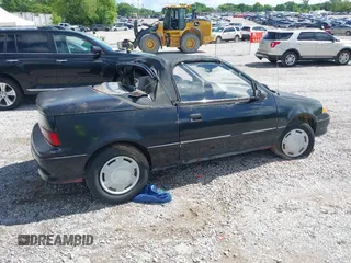 1993 Geo Metro z VIN JG1MR3363PK200242, wystawiony jako IAAI lot #42173417 z przebiegiem 151 862 mil mil oraz . Historia ofert i sprzedaży dostępna na DreamBid. Obrazek 4.