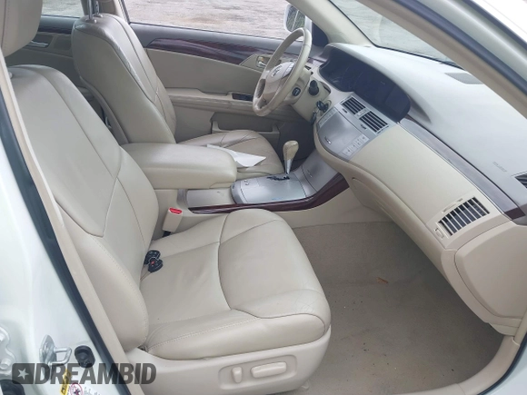2010 Toyota Avalon XL with VIN 4T1BK3DB8AU354533, listed as a IAAI auction lot 41802797 with 117,956 mi miles and . Bid and sale history available at carsss.com. Image 5.