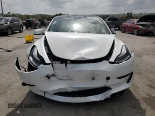 2023 Tesla Model 3 with VIN 5YJ3E1EA8PF499535, listed as a Copart auction lot 59974115 with 18,365 mi miles and Salvage title. Bid and sale history available at DreamBid. Image 5.