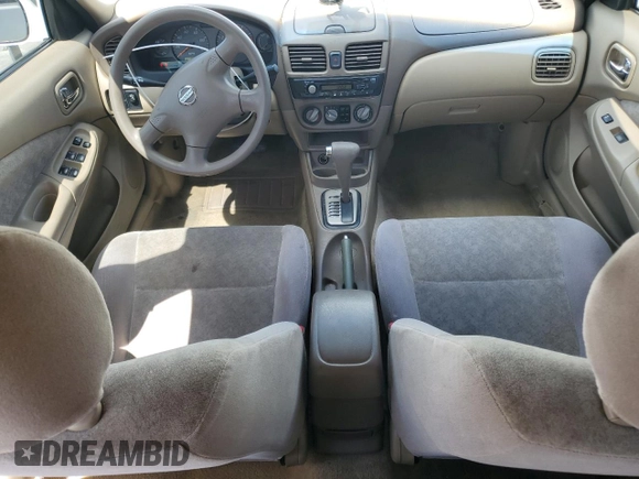 2003 Nissan Sentra XE with VIN 3N1CB51D53L797331, listed as a Copart auction lot 51017035 with 127,530 mi miles and Salvage Title. Bid and sale history available at DreamBid. Image 8.