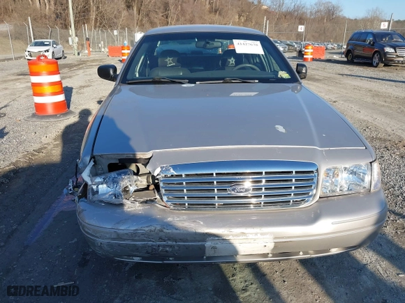 2005 Ford Crown Victoria LX with VIN 2FAFP74W85X121984, listed as a IAAI auction lot 41427678 with 113,437 mi miles. Bid and sale history available at carsss.com. Image 12.