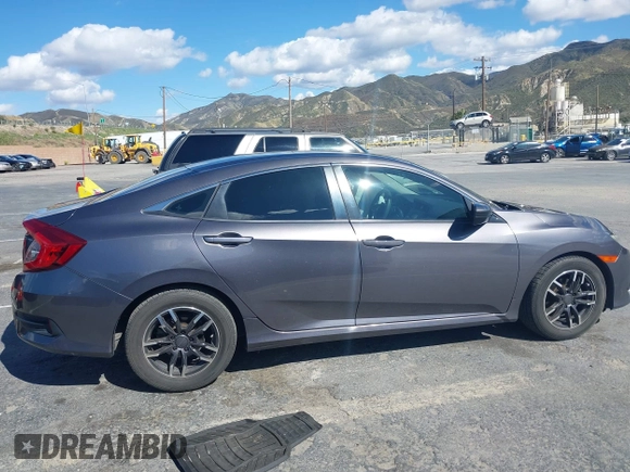 2016 Honda Civic Sedan LX with VIN 19XFC2F51GE034644, listed as a IAAI auction lot 41939884 with 59,433 mi miles. Bid and sale history available at carsss.com. Image 12.