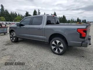 2023 Ford F-150 Lightning Pro with VIN 1FT6W1EV9PWG25278, listed as a Copart auction lot 60293095 with 24,450 mi miles and Salvage title. Bid and sale history available at DreamBid. Image 2.