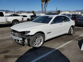 2014 BMW 7 Series 750i с VIN WBAYA8C56ED825303, выставлен на аукционе Copart как лот 46189695 с пробегом 77 573 миль миль и Списание • Salvage title. История ставок и продаж доступна на DreamBid. Изображение 1.
