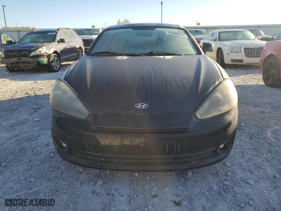 2008 Hyundai Tiburon GS with VIN KMHHM66DX8U291983, listed as a Copart auction lot 74586874 with 111,572 mi miles and Salvage Title. Bid and sale history available at carsss.com. Image 5.