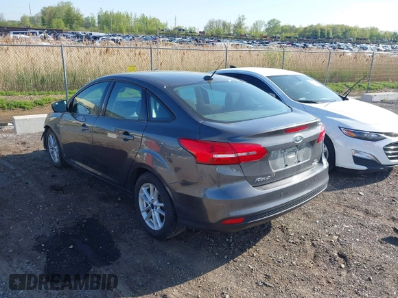 2016 Ford Focus SE with VIN 1FADP3F23GL252346, listed as a IAAI auction lot 42247184 with 99,025 mi miles and . Bid and sale history available at DreamBid. Image 3.