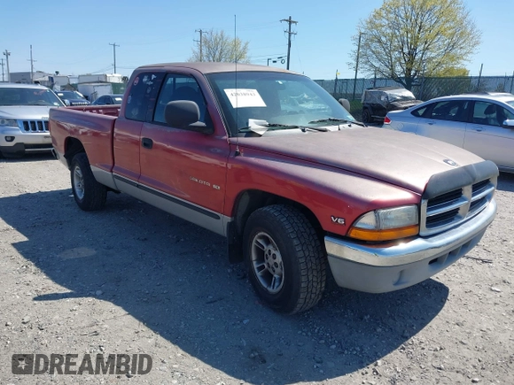 1999 Dodge Dakota SLT z VIN 1B7GL22X2XS222162, wystawiony jako IAAI lot #42038943 z przebiegiem 222 883 mil mil oraz . Historia ofert i sprzedaży dostępna na DreamBid. Obrazek 1.