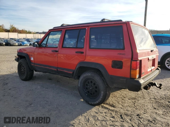 1994 Jeep Cherokee Sport with VIN 1J4FJ68S3RL239208, listed as a Copart auction lot 79121184 with 226,579 mi miles and Salvage title. Bid and sale history available at DreamBid. Image 2.