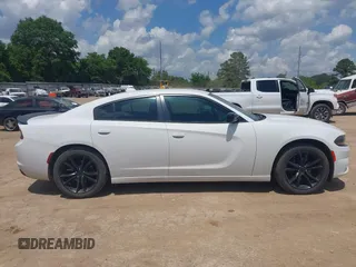 2016 Dodge Charger SXT with VIN 2C3CDXHG1GH174892, listed as a IAAI auction lot 42096098 with 244,598 mi miles and . Bid and sale history available at carsss.com. Image 13.