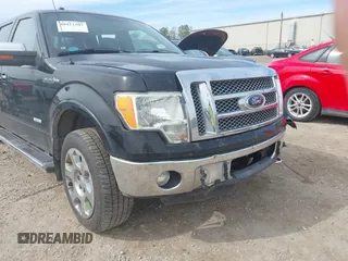 2011 Ford F-150 XLT with VIN 1FTFW1ET3BFC15177, listed as a IAAI auction lot 40412307 with 156,183 mi miles. Bid and sale history available at carsss.com. Image 20.