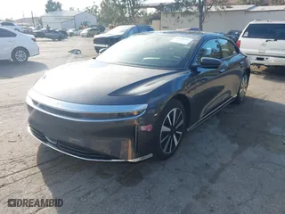 2024 Lucid Air Pure with VIN 50EA1PGA4RA004886, listed as a IAAI auction lot 41349451 with 4,165 mi miles. Bid and sale history available at carsss.com. Image 2.