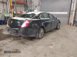 2014 Lincoln MKS with VIN 1LNHL9DK8EG609955, listed as a IAAI auction lot 41580770 with 109,864 mi miles. Bid and sale history available at carsss.com. Image 4.