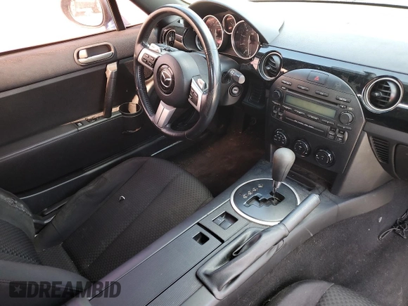 2006 Mazda MX-5 Miata Sport z VIN JM1NC25F760122353, wystawiony jako Copart lot #53557585 z przebiegiem 150 409 mil mil oraz Szkoda całkowita • Salvage title. Historia ofert i sprzedaży dostępna na DreamBid. Obrazek 8.