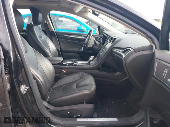 2013 Ford Fusion Titanium with VIN 3FA6P0K95DR153437, listed as a IAAI auction lot 42334754 with 139,623 mi miles and . Bid and sale history available at DreamBid. Image 5.