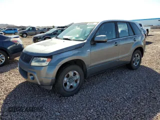 2006 Suzuki Grand Vitara z VIN JS3TE941264100223, wystawiony jako Copart lot #48559885 z przebiegiem 205 324 mil mil oraz Tytuł czysty. Historia ofert i sprzedaży dostępna na DreamBid. Obrazek 1.