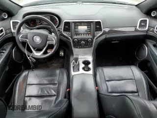 2016 Jeep Grand Cherokee Overland with VIN 1C4RJFCG3GC364485, listed as a Copart auction lot 60727935 with 101,742 mi miles and Salvage title. Bid and sale history available at DreamBid. Image 8.