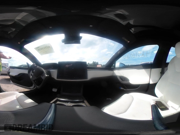 2021 Tesla Model S Long Range with VIN 5YJSA1E57MF428512, listed as a IAAI auction lot 42511020 with 29,611 mi miles and . Bid and sale history available at DreamBid. Image 21.