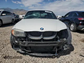 2012 BMW 1 Series 135i with VIN WBAUC9C52CVM12915, listed as a Copart auction lot 67145834 with 114,306 mi miles and Salvage title. Bid and sale history available at DreamBid. Image 5.