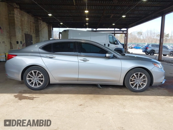 2018 Acura TLX with VIN 19UUB1F33JA008710, listed as a IAAI auction lot 41772704 with 111,533 mi miles and . Bid and sale history available at DreamBid. Image 13.
