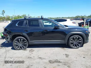2023 Mazda CX-50 2.5 Turbo with VIN 7MMVABXY1PN126178, listed as a IAAI auction lot 41707411 with 27,179 mi miles. Bid and sale history available at carsss.com. Image 14.