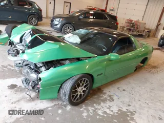 2000 Chevrolet Camaro Z28 z VIN 2G1FP22G0Y2103689, wystawiony jako IAAI lot #42173195 z przebiegiem Nie podano mil oraz . Historia ofert i sprzedaży dostępna na DreamBid. Obrazek 16.