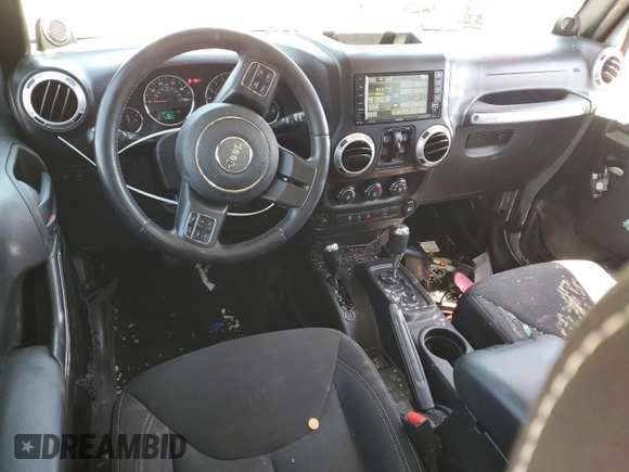 2014 Jeep Wrangler Unlimited Rubicon with VIN 1C4HJWFG1EL241014, listed as a Copart auction lot 63948655 with 165,650 mi miles and Salvage title. Bid and sale history available at DreamBid. Image 8.