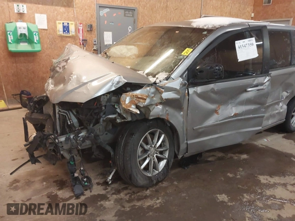 2015 Dodge Grand Caravan SE with VIN 2C4RDGBG1FR738659, listed as a IAAI auction lot 41547350 with 96,621 mi miles and . Bid and sale history available at DreamBid. Image 6.