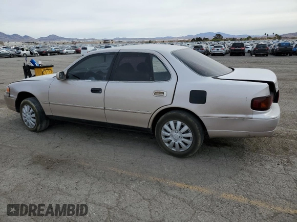 1996 Toyota Camry DX with VIN 4T1BG12K0TU809838, listed as a Copart auction lot 48985365 with 194,822 mi miles and Salvage Title. Bid and sale history available at carsss.com. Image 2.