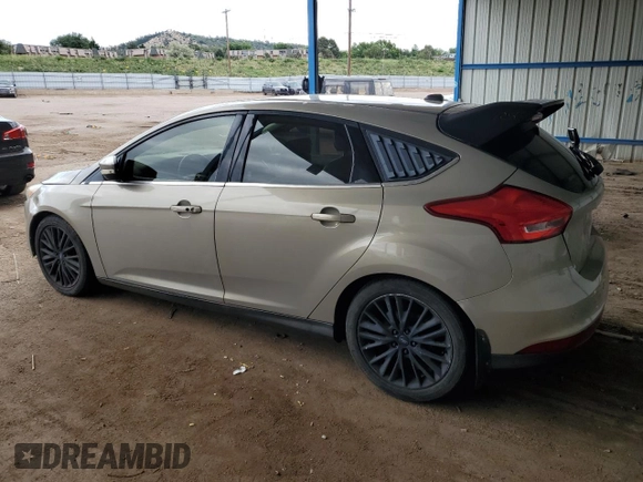 2015 Ford Focus Titanium с VIN 1FADP3N27FL210598, выставлен на аукционе Copart как лот 61410955 с пробегом 126 394 миль миль и Чистый • Clean title. История ставок и продаж доступна на DreamBid. Изображение 2.