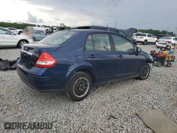 2009 Nissan Versa S with VIN 3N1BC11E19L433572, listed as a Copart auction lot 54084215 with 144,178 mi miles and Salvage title. Bid and sale history available at DreamBid. Image 3.