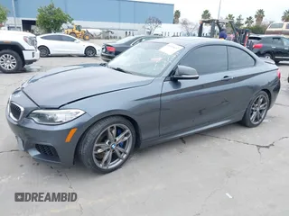 2015 BMW 2 Series M235i with VIN WBA1J7C50FV358774, listed as a IAAI auction lot 41559637 with 82,344 mi miles and . Bid and sale history available at carsss.com. Image 18.