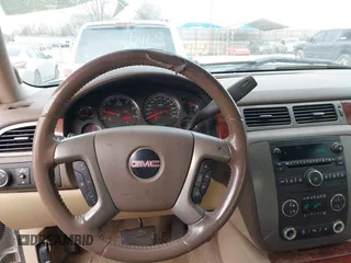 2010 GMC Sierra 1500 SLT z VIN 3GTRCWE00AG287606, wystawiony jako IAAI lot #41406243 z przebiegiem 218 866 mil mil oraz . Historia ofert i sprzedaży dostępna na DreamBid. Obrazek 19.