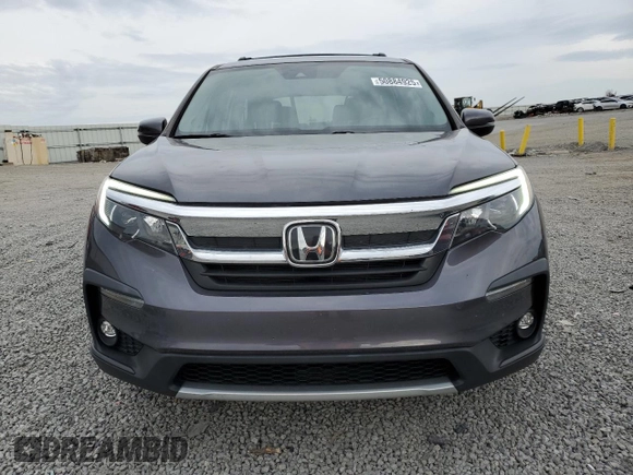 2020 Honda Pilot EX z VIN 5FNYF6H35LB011844, wystawiony jako Copart lot #50884925 z przebiegiem 62 852 mil mil oraz Szkoda całkowita • Salvage title. Historia ofert i sprzedaży dostępna na DreamBid. Obrazek 5.