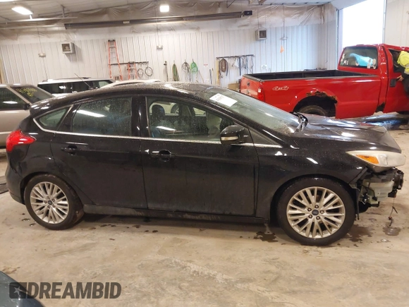 2017 Ford Focus Titanium with VIN 1FADP3N25HL222297, listed as a IAAI auction lot 41698707 with 121,756 mi miles and . Bid and sale history available at carsss.com. Image 13.