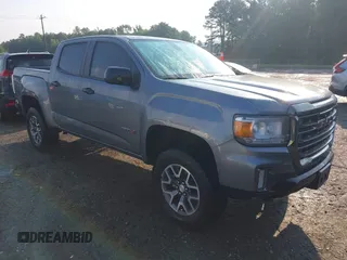 2021 GMC Canyon 4WD AT4 z VIN 1GTG6FEN1M1295341, wystawiony jako IAAI lot #42226918 z przebiegiem 39 203 mil mil oraz . Historia ofert i sprzedaży dostępna na DreamBid. Obrazek 1.