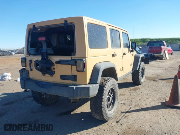 2013 Jeep Wrangler Unlimited Rubicon with VIN 1C4BJWFG3DL632668, listed as a IAAI auction lot 41751546 with 153,149 mi miles. Bid and sale history available at carsss.com. Image 4.