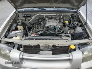 2003 Nissan Frontier SE z VIN 1N6ED29X13C472455, wystawiony jako Copart lot #48589435 z przebiegiem 170 480 mil mil oraz Szkoda całkowita • Salvage title. Historia ofert i sprzedaży dostępna na DreamBid. Obrazek 13.
