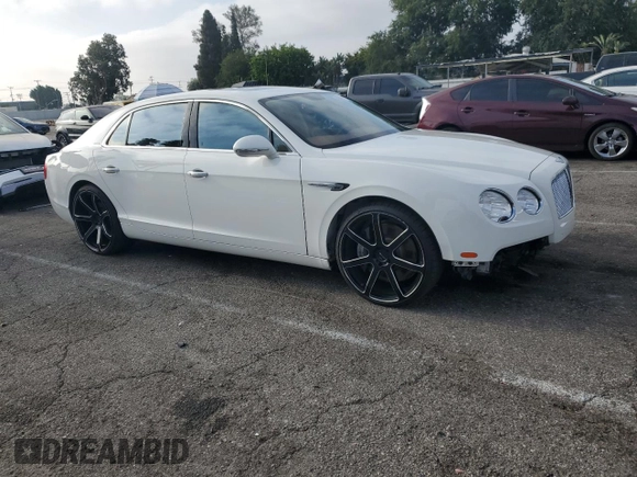 2015 Bentley Flying Spur z VIN SCBEC9ZAXFC041601, wystawiony jako Copart lot #62028895 z przebiegiem 43 943 mil mil oraz Szkoda całkowita • Salvage title. Historia ofert i sprzedaży dostępna na DreamBid. Obrazek 4.