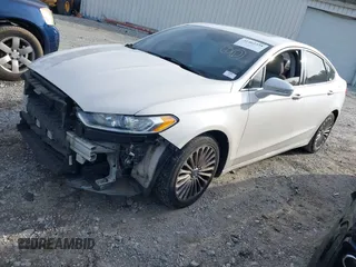 2015 Ford Fusion Titanium with VIN 3FA6P0K92FR274994, listed as a IAAI auction lot 41402325 with 157,332 mi miles. Bid and sale history available at carsss.com. Image 2.