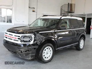 2023 Ford Bronco Sport Heritage z VIN 3FMCR9G60PRE07470, wystawiony jako Copart lot #60569615 z przebiegiem 16 236 mil mil oraz Szkoda całkowita • Salvage title. Historia ofert i sprzedaży dostępna na DreamBid. Obrazek 2.
