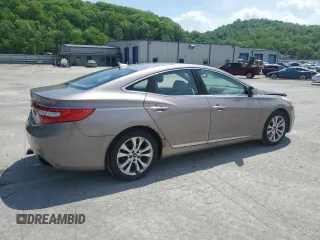 2013 Hyundai Azera z VIN KMHFG4JG4DA240690, wystawiony jako Copart lot #57465565 z przebiegiem 164 757 mil mil oraz Szkoda całkowita • Salvage title. Historia ofert i sprzedaży dostępna na DreamBid. Obrazek 3.