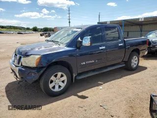 2006 Nissan Titan SE with VIN 1N6AA07B16N517468, listed as a Copart auction lot 63409145 with 203,678 mi miles and Salvage title. Bid and sale history available at DreamBid. Image 1.