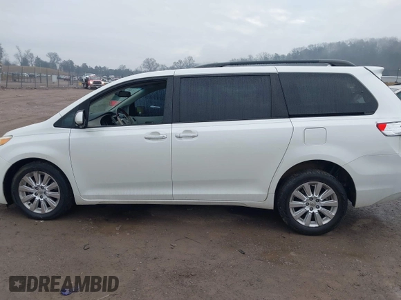 2011 Toyota Sienna XLE with VIN 5TDDK3DC8BS010051, listed as a IAAI auction lot 41405424 with 293,348 mi miles. Bid and sale history available at carsss.com. Image 14.