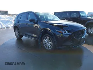 2023 Mazda CX-5 Signature with VIN JM3KFBXY2P0128644, listed as a IAAI auction lot 41753947 with 79,204 mi miles and . Bid and sale history available at carsss.com. Image 1.