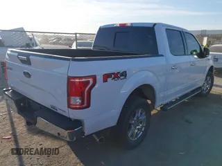 2015 Ford F-150 XLT with VIN 1FTEW1EF1FFA15054, listed as a IAAI auction lot 41780219 with 185,059 mi miles. Bid and sale history available at carsss.com. Image 4.