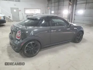 2012 MINI Coupe S z VIN WMWSX3C51CT408195, wystawiony jako Copart lot #77008744 z przebiegiem Nie podano mil oraz Szkody całkowita. Historia ofert i sprzedaży dostępna na DreamBid. Obrazek 3.